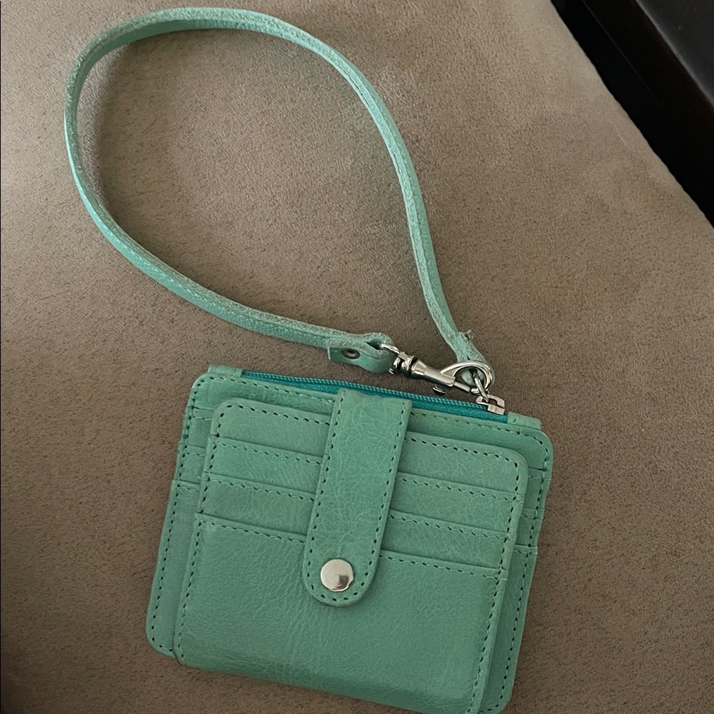 Pure Dixie leather wallet with wrist strap.